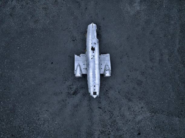 istock an airplane that is sitting on the ground with two engines: Abandoned US Navy DC Plane 1687237972