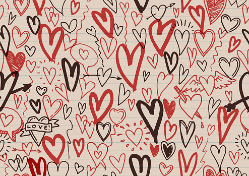Fun red and black valentines hearts sketchy doodles and child-like drawings on ruled note paper