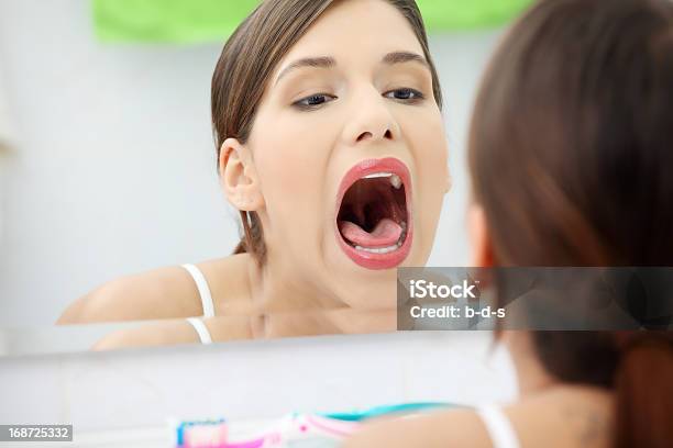 Pain In Throat Stock Photo - Download Image Now - Mouth Open, Looking, Mirror - Object