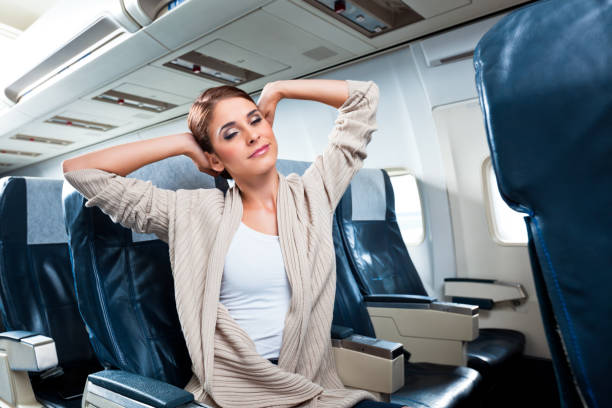 istock Woman on an airplane 168725853