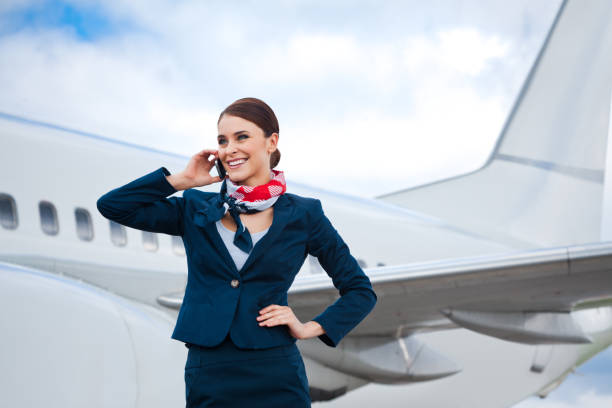 istock Air stewardess talking on phone 168725877