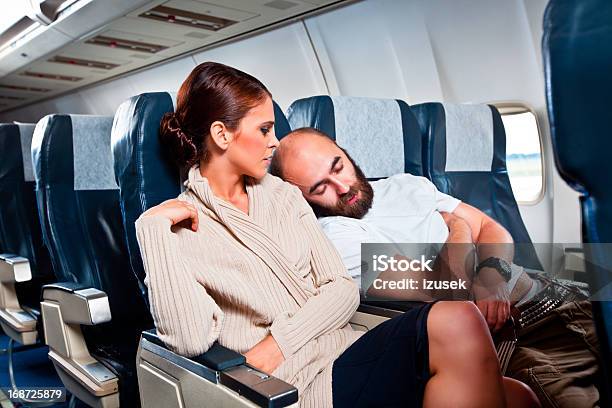 Rude Passenger On The Airplane Stock Photo - Download Image Now - Airplane, Passenger, Irritation