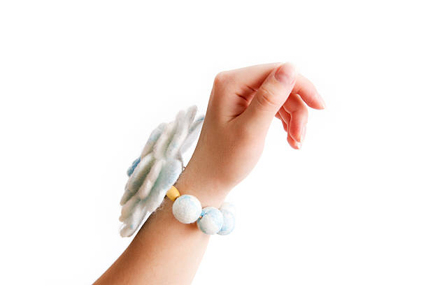 istock Woman's hand with the decoration of wool 168726581