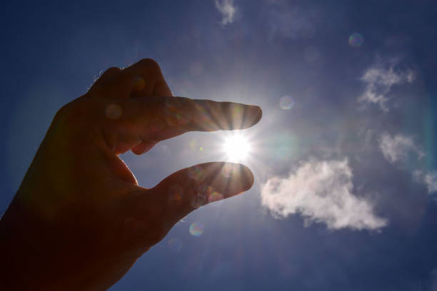 istock Hand over the Sky and Sun 1687266138