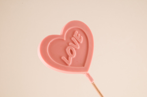 Photo picture of a Lollipop heart shaped love concept