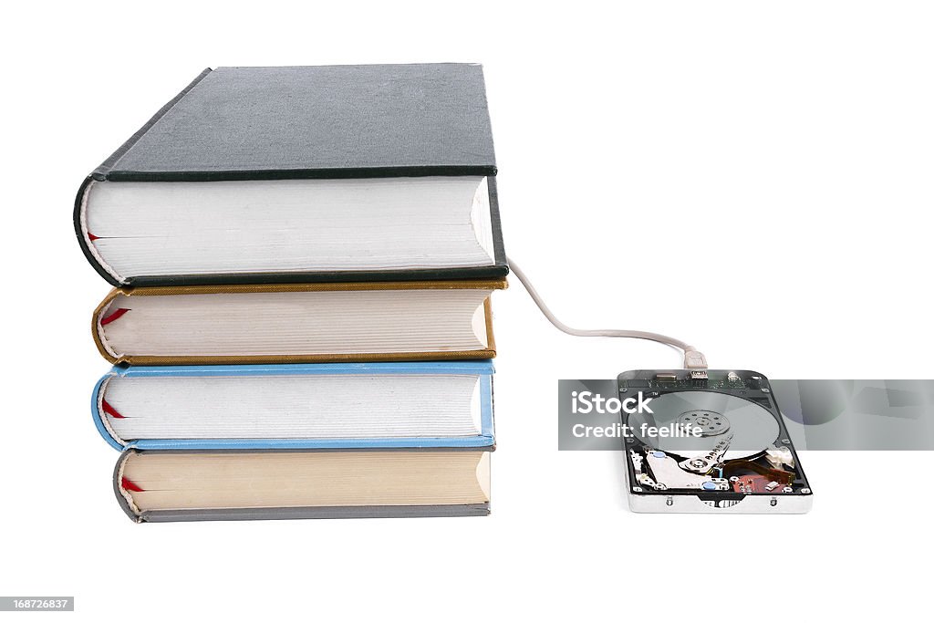 Data base:hard disk and book hard disk and book isolated on white background Book Stock Photo
