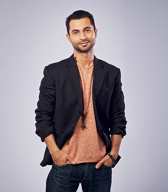 istock Confident Guy Smiling and Looking at You 168727052