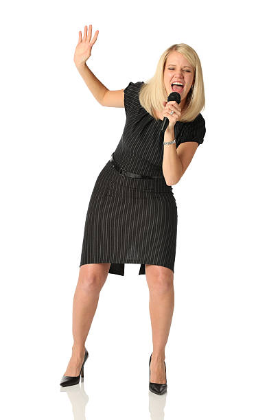 istock Isolated businesswoman singing into microphone 168727994