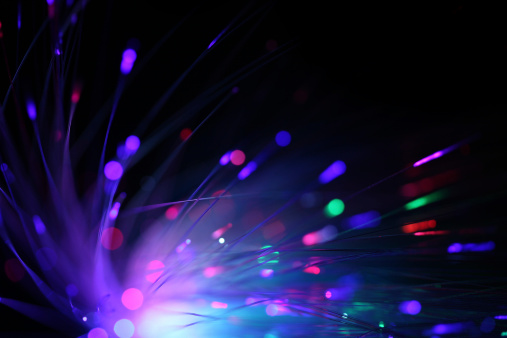 abstract optic fiber tech background, shallow depth of field. Concept for digital data transfers.