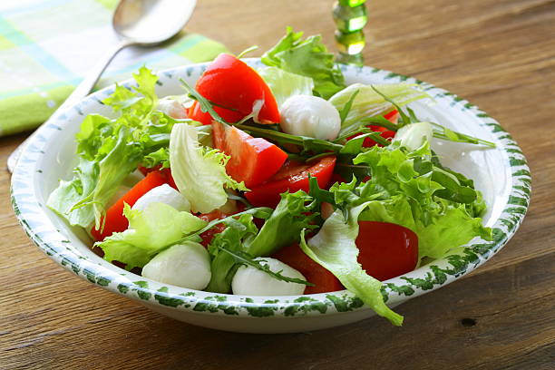 istock salad with arugula, tomatoes and mozzarella cheese 168730507
