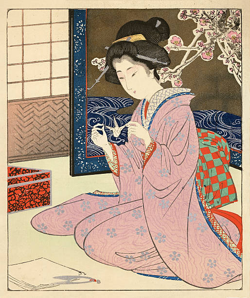 Japanese Woodblock of a female making Origami Japanese scene from the master Kunisada 1786-1865,a woodblock print, circa 1845 from the Edo period, showing a female figure sitting by a window in traditional Kimono. In her hand is an origami paper folded bird. The interior has screens, a box, traditional scissors and paper for folding. kimono photos stock illustrations