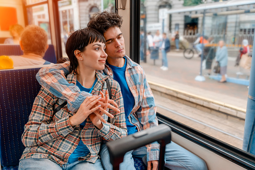 couple hugging on a bus, tram Lifestyle concept