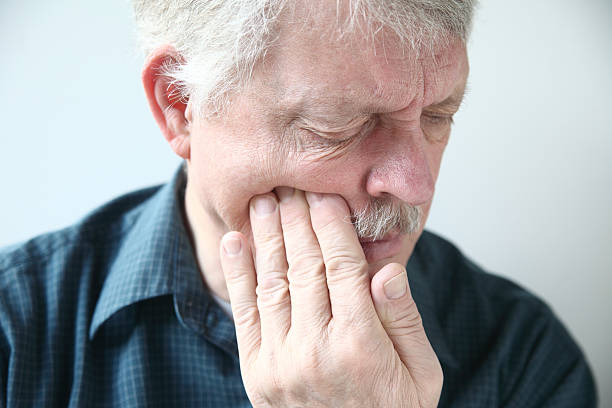 istock man suffers from face pain 168736865