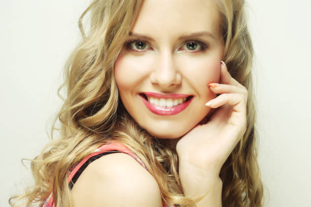 pretty blond girl smiling and laughing