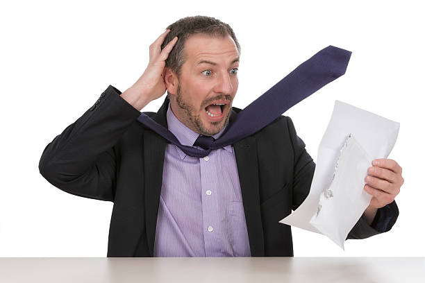 istock Businessman is horrified by a unbelievable bill  I 168757757