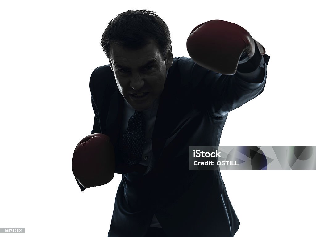 Uomo d'affari boxe con guanti da boxe Sagoma - Foto stock royalty-free di Adulto