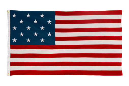 A replica of the flag that was flying over Fort McHenry during the war of 1812 when Francis Scott Key wrote a poem, Defence of Fort McHenry, that became the national anthem of the USA. This flag is also known as the Great Garrison Flag. The Star-Spangled Banner flag has 15 stars and stripes that represent the original 13 colonies plus Vermont and Kentucky.