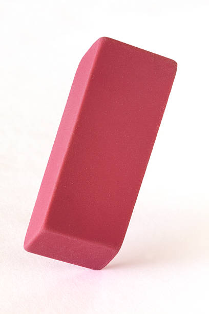 istock Pink Eraser on Sheet of White Paper 168763533