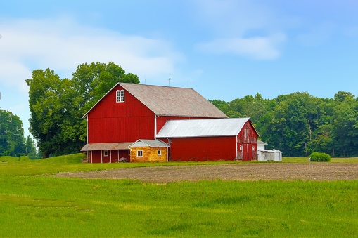 Red barn with plowed field- Amish Country- Northern Indiana