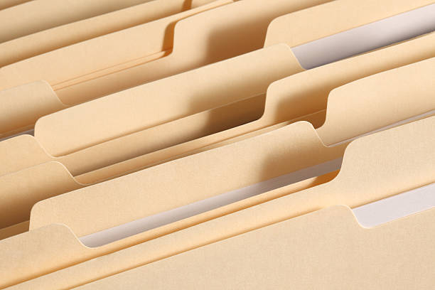 High resolution image featuring blank file folder tabs for your copy. Primary focus on tabs near the front of the image.