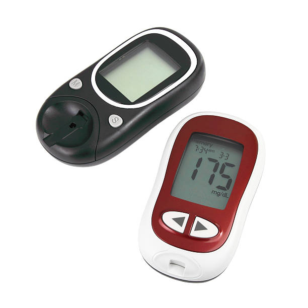 白い背景の上の 2 つの glucometer - glucose blood care white ストックフォトと画像