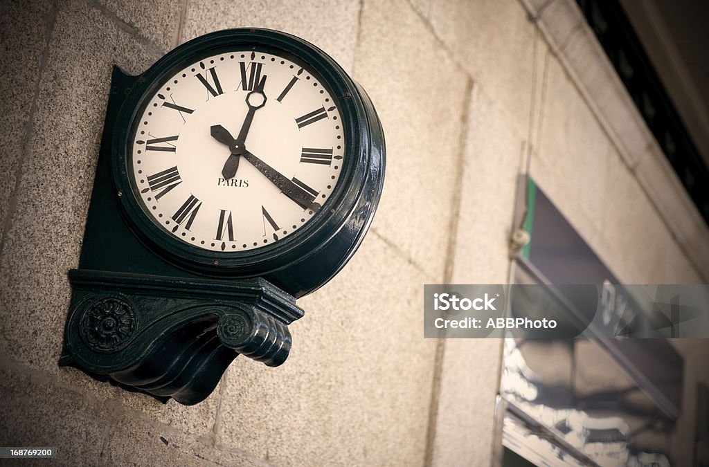 Outdoor analog clock in a railway station Railway station outdoor analog clock with roman numbers Antique Stock Photo