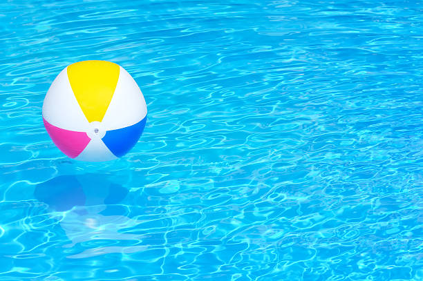 istock Inflatable ball in swimming pool 168769319