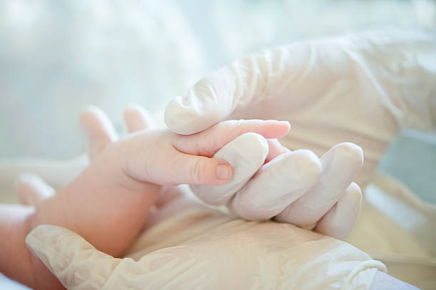 istock Helping hand to little baby 168769724