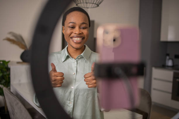 istock Young woman is recording a vlog 1687700201