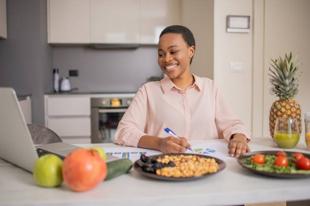 istock Young nutritionist is creating a meal plan 1687701818