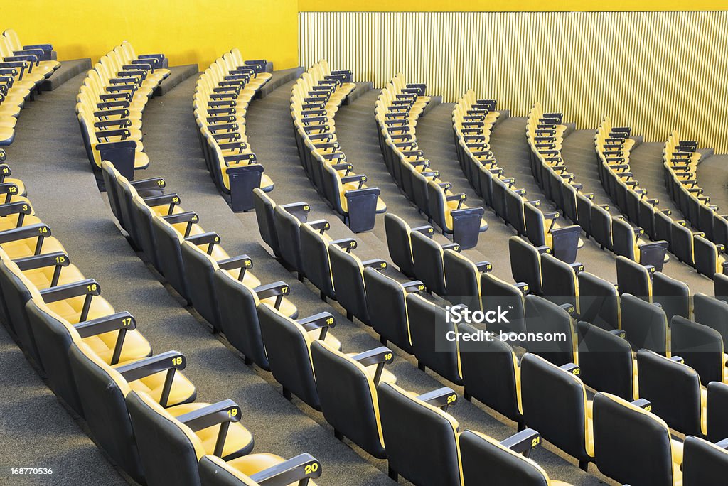 Conference hall Yellow chairs in conference hall Armchair Stock Photo