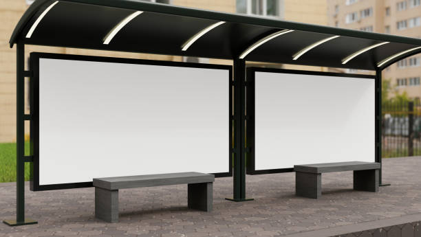 istock Large empty horizontal commercial billboards mockup mounted on a bus stop in a city. 1687713548