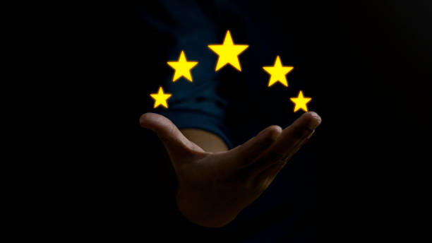 istock Customer evaluation feedback. Man is giving five star rating for client's Satisfaction Surveys. 1687717392