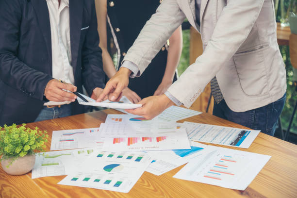 istock Business strategy team report chart, graph, infographic data analyze financial report plan. Hands team partner planning marketing finance statistics sale report with excel spreadsheet accountting 1687756136