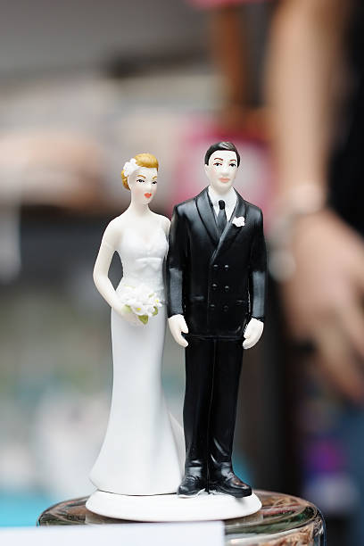 istock Figurines on top of wedding cake 168775622