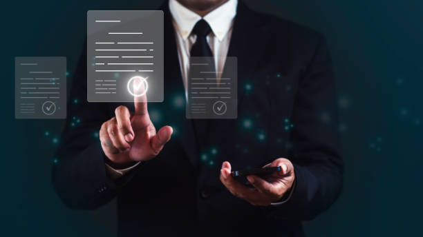 istock Businessman is working on smartphone with virtual screen. Online documentation database and document management system concept. 1687759858