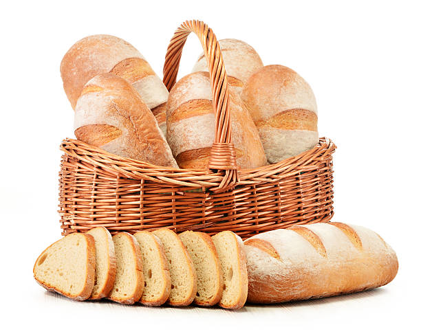 istock Loafs of bread in wicker basket isolated on white 168776292