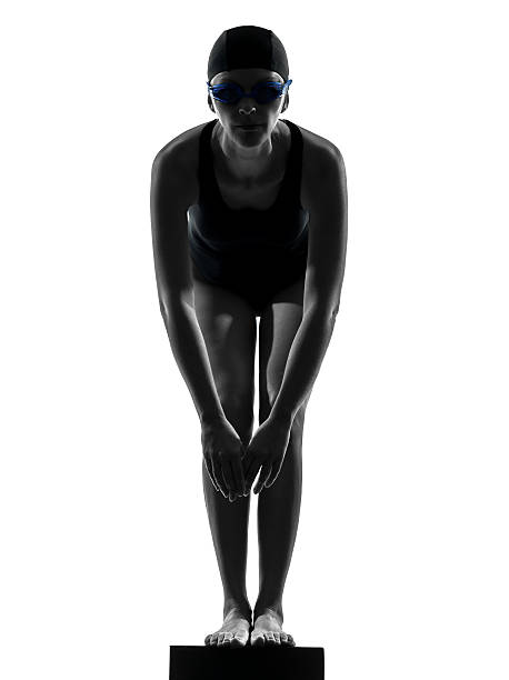 istock woman competition swimmer on starting silhouette 168776497