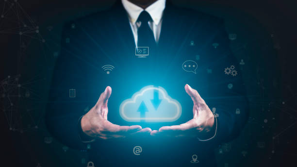 istock Businessman is holding cloud computing network against cyber dark background. 1687765798