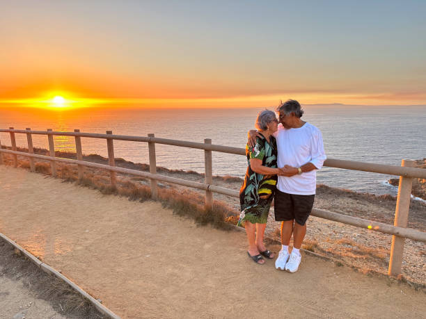 istock Elderly couple enjoying the sunset 1687790673