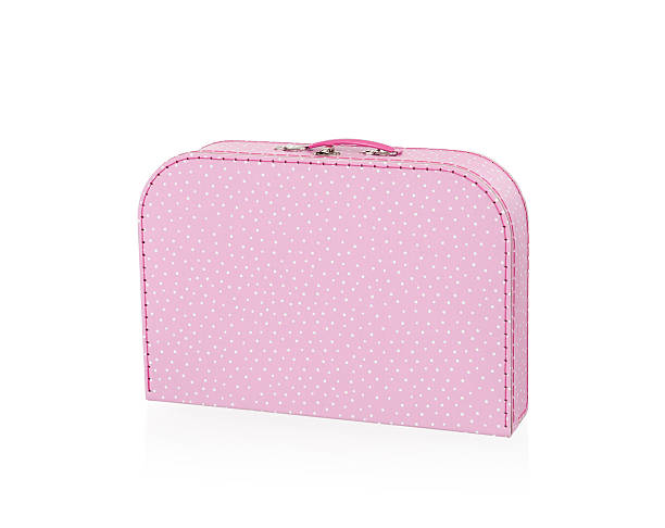 istock pink with white dots suitcase, isolated 168779477