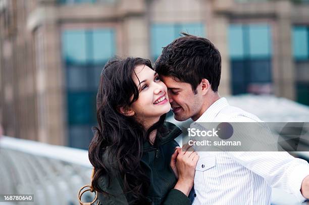 Young Couple Being In Love On Bridge Stock Photo - Download Image Now - 20-24 Years, 20-29 Years, 25-29 Years