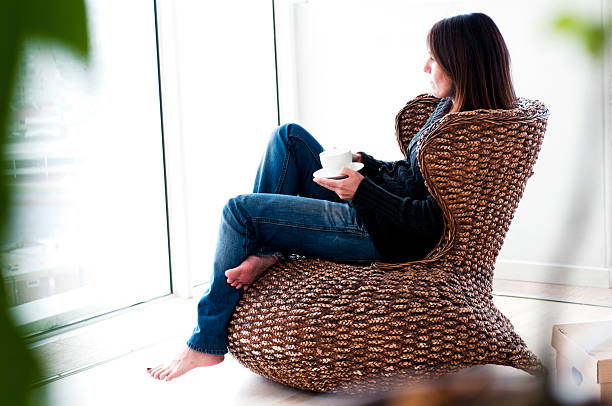 istock Young female relaxing in white apartment 168780876