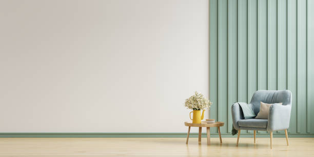 istock Room interior has green armchair on empty white wall background. 1687816937