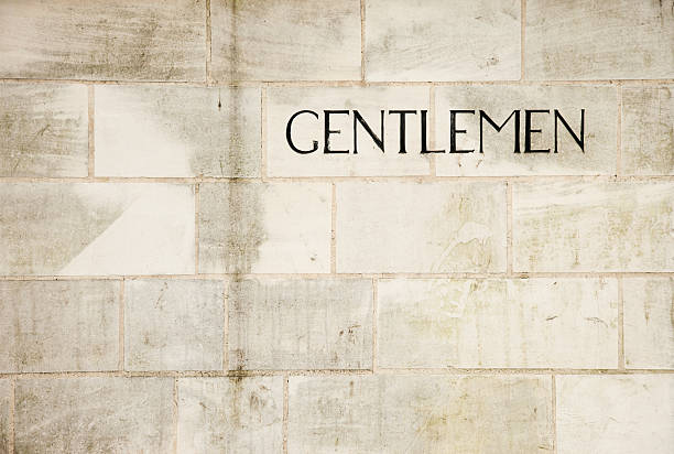 istock Gentlemen sign on stone wall 168785577