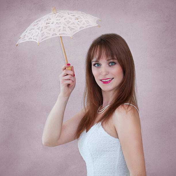 istock Girl with umbrella 168786341