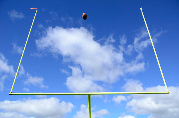 American Football and Goal Posts stock photo