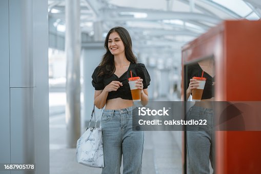 istock Millennial digital nomads work remotely, using laptops to connect , create content on the move. 1687905178