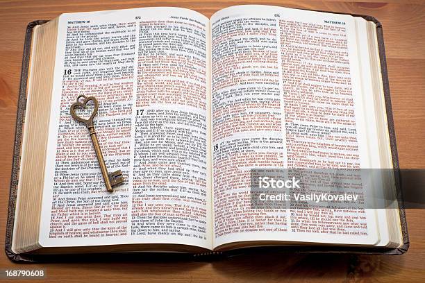 Key On The Open Bible Stock Photo - Download Image Now - God, Single Word, Jesus Christ