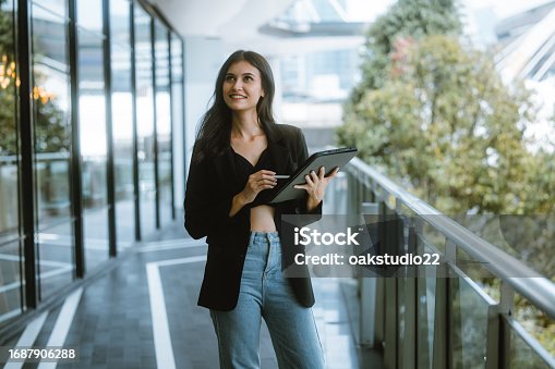 istock Millennial digital nomads work remotely, using laptops to connect , create content on the move. 1687906288